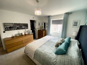Bedroom One- click for photo gallery